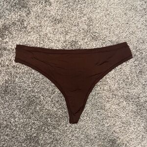 Brown silk thong